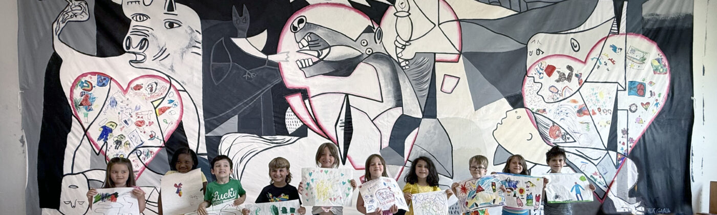 kids in front of guernica mural project
