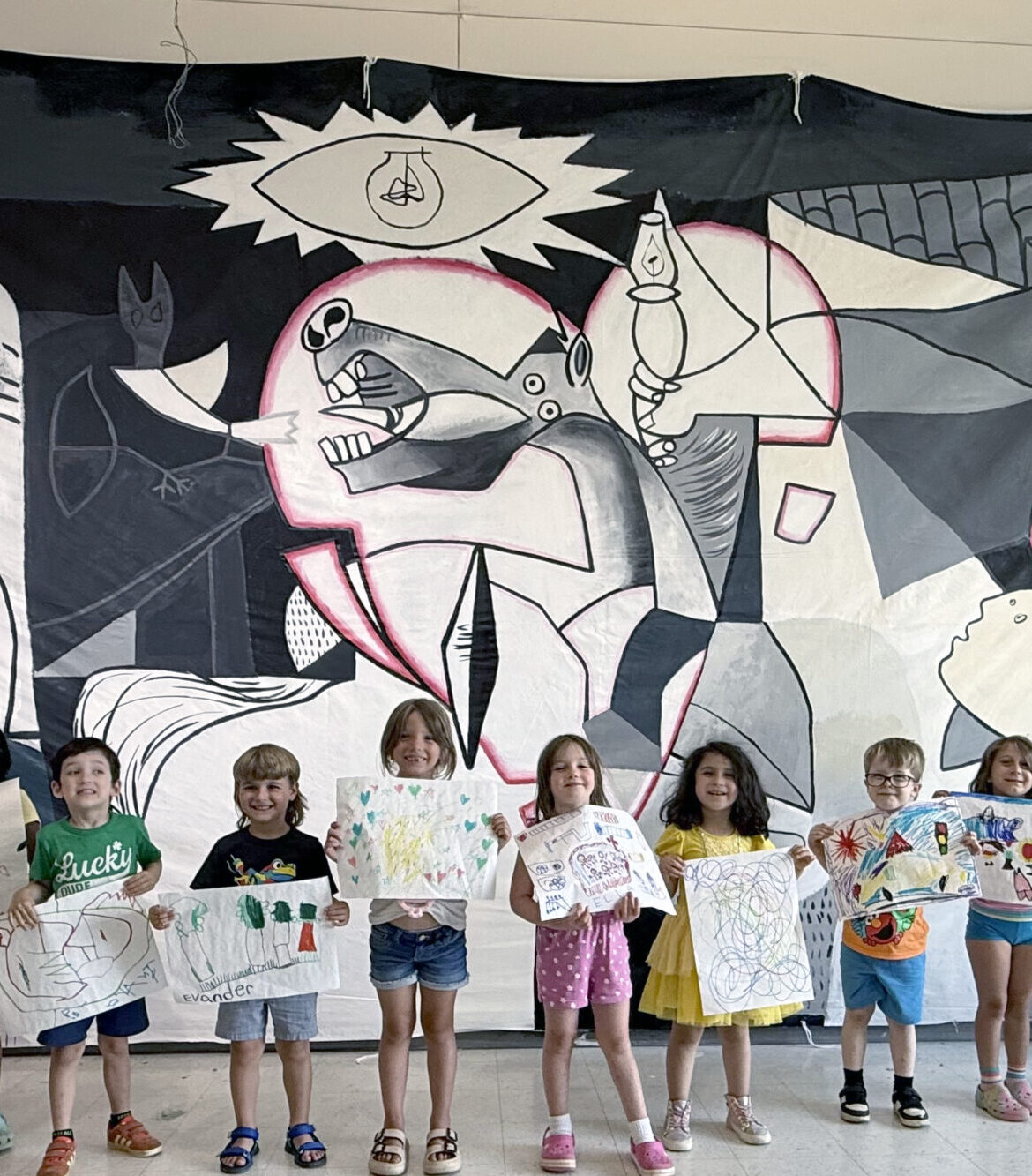 kids in front of guernica mural project