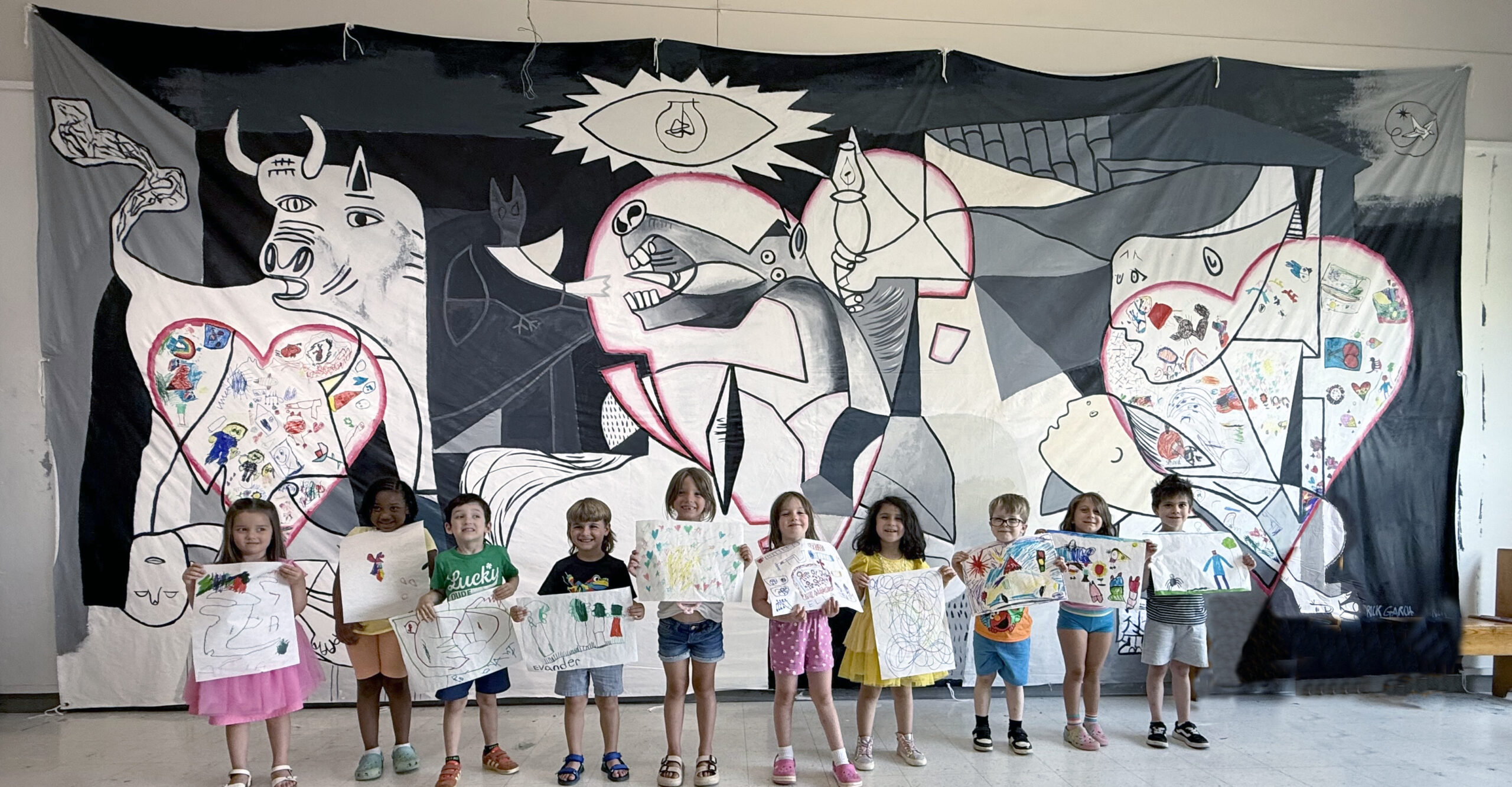 kids in front of guernica mural project